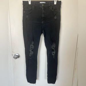 Black wash ripped skinny jeans